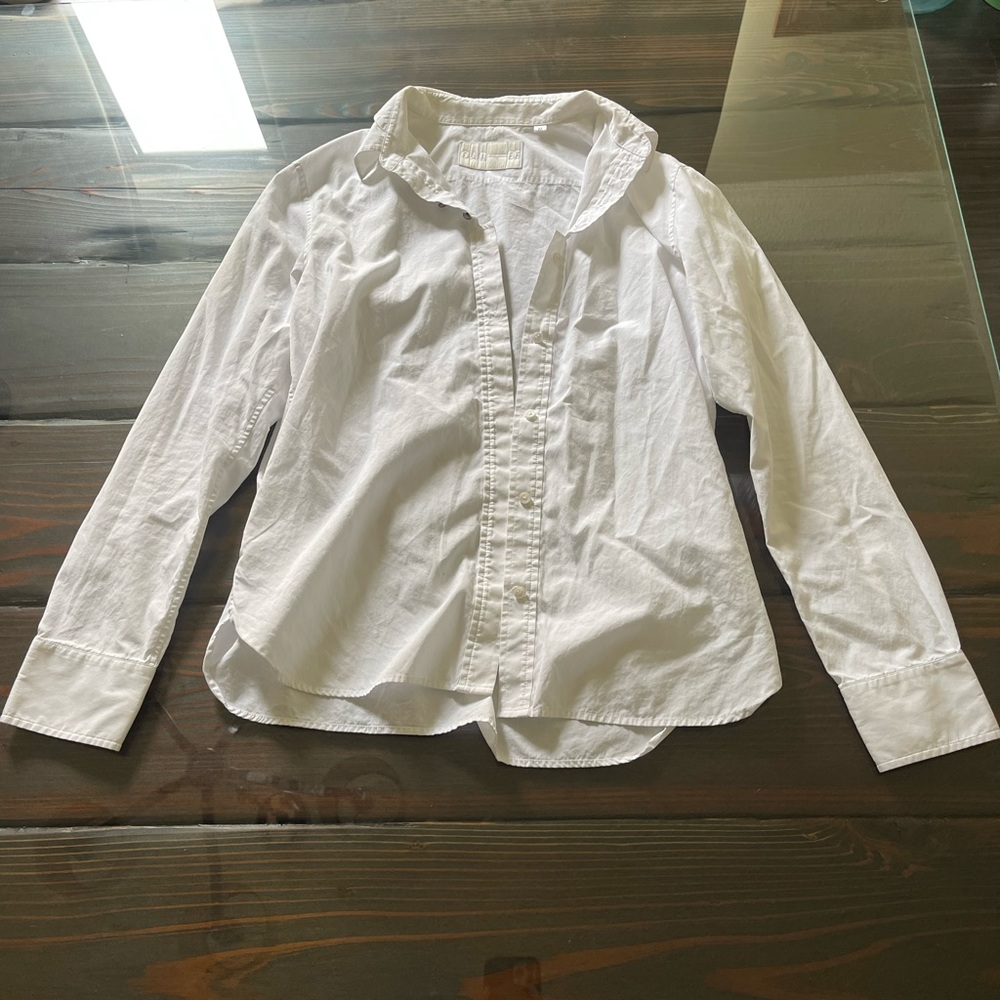 New york small brand button up with silver button details on the first few